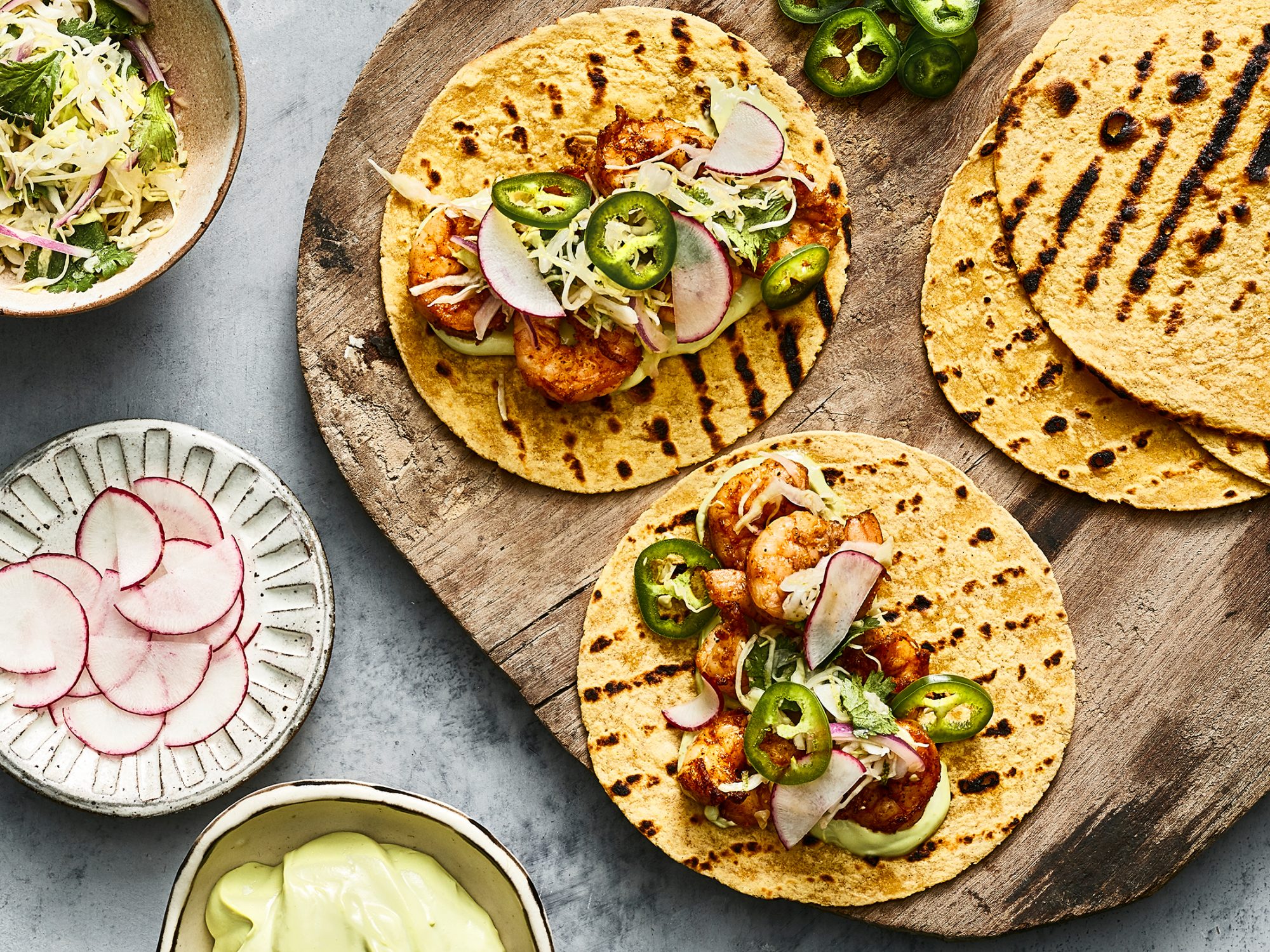 Shrimp Tacos With Cilantro Lime Slaw And Avocado Crema image